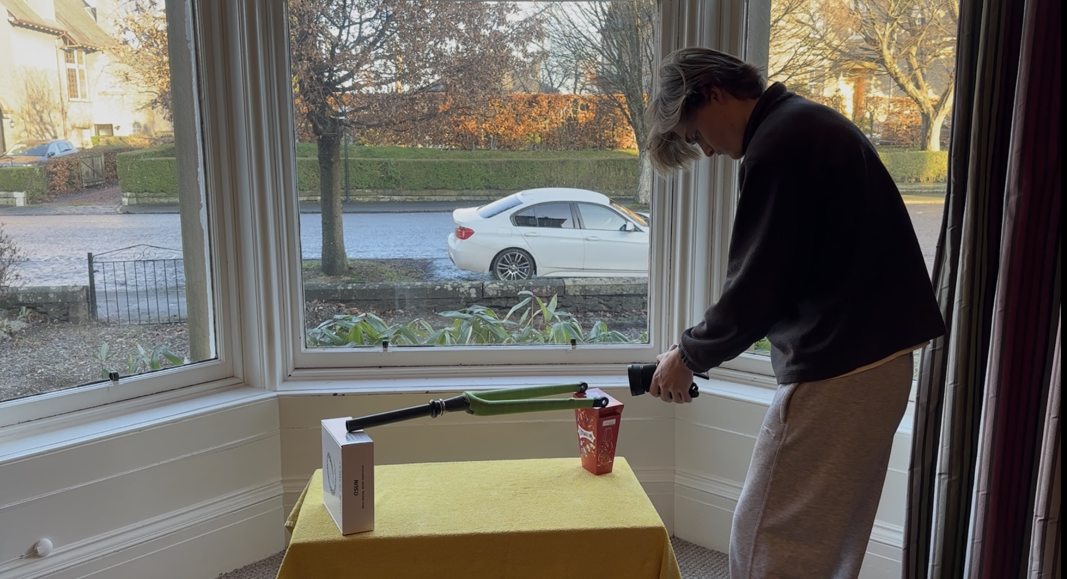Matthew taking reference photos of the fork for photogrammetry, 300+ images captured